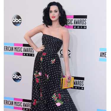 <p>KPez pulled out all the stops and totally rocked her floral and polka dot Oscar de la Renta frock, before opening the AMAs dressed as a Geisha. Check out also her <span class="st">quirky Olympia Le-Tan dictionary clutch</span>.</p>
<p><a href="http://www.cosmopolitan.co.uk/fashion/news/miley-cyrus-amas-2013-outfits" target="_blank">MILEY CYRUS WINS THE INTERNET AT THE AMAs</a></p>
<p><a href="http://www.cosmopolitan.co.uk/beauty-hair/news/styles/celebrity/ama-2013-best-celebrity-hairstyles" target="_blank">SEE THE BEST CELEBRITY HAIR AT THE AMAs</a></p>
<p><a href="http://www.cosmopolitan.co.uk/fashion/celebrity/" target="_blank">GET THE LATEST CELEBRITY STYLE NEWS</a></p>