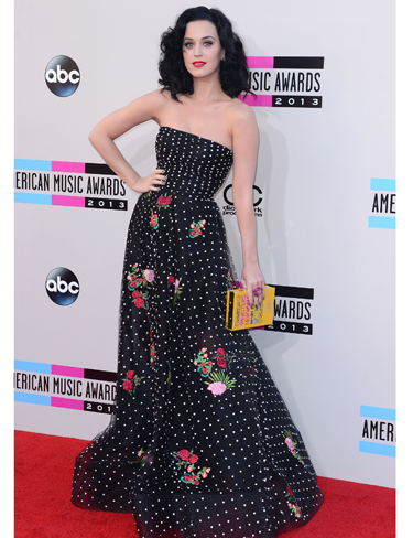<p>KPez pulled out all the stops and totally rocked her floral and polka dot Oscar de la Renta frock, before opening the AMAs dressed as a Geisha. Check out also her <span class="st">quirky Olympia Le-Tan dictionary clutch</span>.</p>
<p><a href="http://www.cosmopolitan.co.uk/fashion/news/miley-cyrus-amas-2013-outfits" target="_blank">MILEY CYRUS WINS THE INTERNET AT THE AMAs</a></p>
<p><a href="http://www.cosmopolitan.co.uk/beauty-hair/news/styles/celebrity/ama-2013-best-celebrity-hairstyles" target="_blank">SEE THE BEST CELEBRITY HAIR AT THE AMAs</a></p>
<p><a href="http://www.cosmopolitan.co.uk/fashion/celebrity/" target="_blank">GET THE LATEST CELEBRITY STYLE NEWS</a></p>