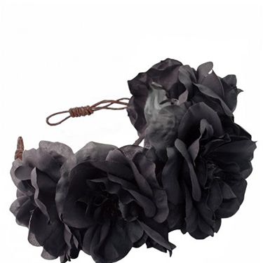 <p class="p1">If bright florals feel a bit more festival than festive, try this incredible black rose crown which will update your staple party outfit. Plus it doubles up as a bad hair day-hider. </p>
<p class="p2">Ophelia Oversized Floral Crown Headband, <span class="s1">£42, <a href="%20http://www.rocknrose.co.uk/headwear-c6/crowns-c15/ophelia-oversized-floral-crown-headband-p484" target="_blank">rocknrose.co.uk</a></span></p>
<p class="p1"><a href="http://www.cosmopolitan.co.uk/fashion/shopping/cheap-christmas-party-dresses" target="_blank">PARTY DRESSES FOR £25 OR LESS</a></p>
<p class="p1"><a href="http://www.cosmopolitan.co.uk/fashion/shopping/christmas-party-accessories-jewellery-bags" target="_blank">PARTY JEWELLERY TO COVET</a></p>
<p class="p1"><a href="http://www.cosmopolitan.co.uk/fashion/shopping/christmas-party-high-heel-shoes" target="_blank">THE BEST PARTY HIGH HEELS</a></p>