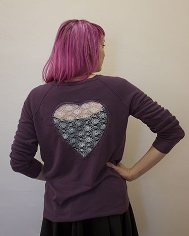 <p>You don't always have to wear your heart on your sleeve; with this guide you can stitch it on the back of an old jumper.</p>
<p><strong>You Will Need:</strong> Jumper, One sizeable Quarter (1/4yd) of Lace, Fabric Large Piece of Paper or Pattern Paper, Pencil, Paper, Scissors, Tailor's Chalk, Fabric Scissors, Pins, Sewing Machine</p>
<p>1. Fold the paper in half, and draw half of a heart along the fold. This heart can be as large as you like. Cut out the heart, then you have your template.</p>
<p>2. Place the heart template onto the back of the jumper to settle on where you'd like the heart cut-out to be, and pin into place.</p>
<p>3. Draw around the template with chalk.</p>
<p>4. Cut out the inside of the heart.</p>
<p>5. Fold the paper template in half, and pin this to the lace fabric on the fold, lining up the edges.</p>
<p>6. Cut out a heart shape in the lace fabric, ensuring you add a 1.5cm seam allowance around the template</p>
<p>7. Turn the jumper inside out, lay the lace over the cut-out and pin into place.</p>
<p>8. Use a small zigzag stitch on your sewing machine to sew the lace heart to the jumper.</p>
<p><a href="http://www.cosmopolitan.co.uk/fashion/shopping/christmas-jumpers?click=main_sr" target="_blank">NEW LOOK'S CHRISTMAS JUMPERS ARE IN</a></p>
<p><a href="http://www.cosmopolitan.co.uk/fashion/news/fearne-cotton-picture-perfect-autumn-jumper?click=main_sr" target="_blank">FEARNE COTTON ROCKS OVERSIZED JUMPER</a></p>
<p><a href="http://www.cosmopolitan.co.uk/blogs/cosmo-blog-awards-2013/best-craft-blog-2013-blogger-hot-topics?click=main_sr" target="_blank">BEST CRAFT BLOG HOT TOPICS</a></p>