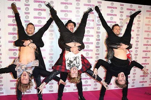 <p>McBusted decided that the standard red carpet routine of pose and pout wasn't for them, so instead they pulled out this move. "We've been at it again. We were feeling brave tonight...well, 3 of us were," they tweeted.</p>
<p><a href="http://www.cosmopolitan.co.uk/celebs/ultimate-women-of-the-year/cosmo-girl-party-fashion" target="_blank">SEE COSMO'S PARTY STYLE</a></p>
<p><a href="http://www.cosmopolitan.co.uk/beauty-hair/news/trends/celebrity-beauty/cosmo-ultimate-women-awards-2013-celebrity-hairstyles-makeup" target="_blank">KILLER HAIR AND MAKE-UP LOOKS AT THE COSMO AWARDS</a></p>
<p><a href="http://www.cosmopolitan.co.uk/celebs/ultimate-women-of-the-year/winners-list-2013" target="_blank">THE COSMOS 2013: THE WINNERS</a></p>