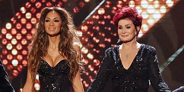 <p>Similarities between Sharon and Nicole's outfits this week: black, sparkly, figure-hugging.</p>
<p>Differences: Nicole's boobs, Nicole's arms, Nicole's legs. Just a bit more revealing then, but both looking fab!</p>
<p><a href="http://www.cosmopolitan.co.uk/fashion/shopping/christmas-party-dress-2013-alternatives" target="_blank">PARTY WEAR BEYOND THE LBD</a></p>
<p><a href="http://www.cosmopolitan.co.uk/fashion/shopping/cheap-christmas-party-dresses" target="_blank">SHOP PARTY DRESSES FOR £25 OR LESS</a></p>
<p><a href="http://www.cosmopolitan.co.uk/fashion/shopping/christmas-party-best-flat-shoes" target="_blank">FABULOUS PARTY FLAT SHOES</a></p>