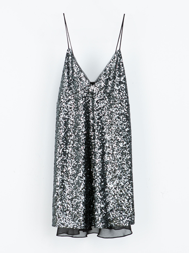 <p>"A sequin dress is a have must for the festive season. I love the delicate spaghetti straps and chiffon underlay of this Zara number. I'll be teaming it with a killer pair of heels for the perfect party look."</p>
<p><strong>Katie Saxon, Fashion Junior</strong></p>
<p>Sequin dress, £59.99, <a href="http://www.zara.com/uk/en/woman/dresses/sequinned-dress-c269185p1668838.html" target="_blank">zara.com</a></p>
<p><a href="http://www.cosmopolitan.co.uk/fashion/shopping/sequin-dress-black-gold" target="_blank">8 WAYS TO WEAR SEQUINS</a></p>
<p><a href="http://www.cosmopolitan.co.uk/fashion/shopping/primark-party-wear-dresses" target="_blank">PRIMARK'S PARTY PIEVCES ARE AMAZING</a></p>
<p><a href="http://www.cosmopolitan.co.uk/fashion/shopping/womens-clothing-under-ten-pounds" target="_blank">DAILY FASHION BUY FOR £10 OR LESS</a></p>