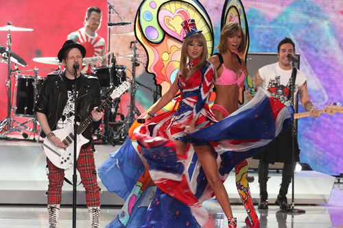 <p>Oh, it's ALL going on here: T-Swizzle in all her Union Jack finery on stage with Fall Out Boy AND Karlie Kloss looking as impressed as we were at Swifty's 'swooshing' skills.</p>
<p><a href="http://www.cosmopolitan.co.uk/fashion/celebrity/best-dressed-victorias-secret-fashion-show" target="_blank">Best dressed at the Victoria's Secret Fashion Show </a></p>
<p><a href="http://www.cosmopolitan.co.uk/fashion/news/cara-delevingne-victorias-secret-show-model" target="_blank">Cara Delevingne: From gurner to sexy Victoria's Secret model </a></p>
<p><a href="http://www.cosmopolitan.co.uk/fashion/news/" target="_blank">See the latest fashion and style news</a></p>