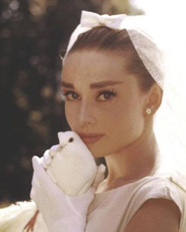 <p>Are we the only ones that could just stare at Audrey Hepburn's face all day? In Funny Face she does simple wedding beauty to perfection, with sleek, pulled back hair and highly-defined eyes, lips and brows.</p>
<p><a href="http://www.cosmopolitan.co.uk/fashion/news/kaley-cuoco-wedding-dress" target="_blank">KALEY CUOCO'S PINK WEDDING DRESS</a></p>
<p><a href="http://www.cosmopolitan.co.uk/beauty-hair/news/trends/celebrity-beauty/best-wedding-makeup-tips-celebrity-makeup?click=main_sr" target="_blank">WEDDING MAKEUP WE WANT TO COPY</a></p>
<p><a href="http://www.cosmopolitan.co.uk/fashion/shopping/top-ten-wedding-dresses-on-film?click=main_sr" target="_blank">TOP TEN WEDDING DRESSES ON FILM</a></p>