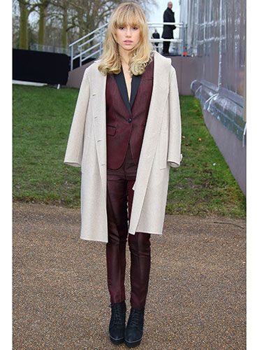 <p>Has someone explained how the armholes on a coat work to Suki? Obviously we're joking, the drape is THE way to wear a coat, and anyway she can do whatever she wants because SHE'S THE ONE KISSING BRADLEY COOPER.</p>
<p><a href="http://www.cosmopolitan.co.uk/fashion/shopping/primark-summer-fashion-trends-2014" target="_blank">PRIMARK'S SPRING FASHION COLLECTION</a></p>
<p><a href="http://www.cosmopolitan.co.uk/fashion/love/love-it-or-loathe-it-daisy-lowe-winter-floral-dress" target="_blank">LOVE IT OR LOATHE IT: DAISY LOWE</a></p>
<p><a href="http://www.cosmopolitan.co.uk/fashion/shopping/womens-clothing-under-ten-pounds" target="_blank">DAILY FASHION FIX: UNDER A TENNER</a></p>