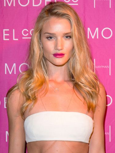 <p>To make your pout pop, go for a hot pink like model Rosie Huntington-Whiteley. Simply pair it with brushed-up brows and a slick of mascara to keep things classy not brassy. <br /> <br />As the face of Model Co, we suspect Rosie is wearing the <a href="http://www.modelcocosmetics.com/shop/party-proof-lipstick" target="_blank">Party Proof Lipstick</a> in Pink Sequin (£16.95) which won't budge – even if you're locking lips.</p>