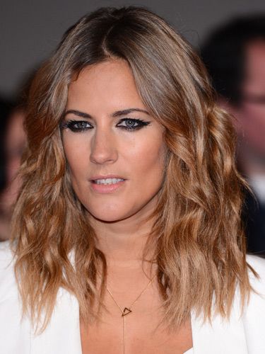 <p>Caroline's tresses were textured with kinky waves yet polished to perfection for their camera close-up. Her sharp feline liner looked perfect against her all-white outfit.</p>
<p><a href="http://www.cosmopolitan.co.uk/beauty-hair/news/styles/celebrity/sexy-date-night-hairstyle-ideas" target="_blank">14 DATE HAIRSTYLE IDEAS</a></p>
<p><a href="http://www.cosmopolitan.co.uk/beauty-hair/news/styles/celebrity/cosmo-hairstyle-of-the-day" target="_self">CELEB HAIRSTYLE OF THE DAY</a></p>
<p><a href="http://www.cosmopolitan.co.uk/beauty-hair/news/styles/hair-trends-spring-summer-2014" target="_blank">HUGE HAIR TRENDS FOR 2014</a></p>
