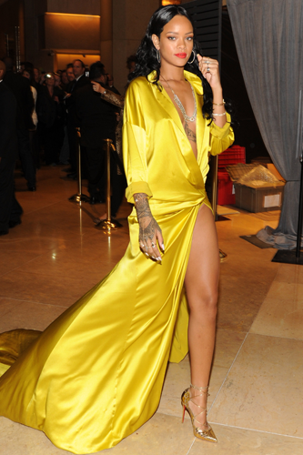 <p>RiRi rocked the pre-party in her WELL low-cut silky yellow dress (that only looked a teeny bit like a dressing gown) and FIERCE pointed, strappy metallic Louboutins.</p>
<p><a href="http://www.cosmopolitan.co.uk/celebs/entertainment/grammys-2014-watch-live-red-carpet-coverage" target="_blank">SEE THE GRAMMYS 2014 RED CARPET DRESSES</a></p>
<p><a href="http://www.cosmopolitan.co.uk/fashion/news/golden-globes-red-carpet-dresses?click=main_sr" target="_blank">ALL THE DRESSES AT THE 2014 GOLDEN GLOBES</a></p>
<p><a href="http://www.cosmopolitan.co.uk/fashion/news/golden-globes-2014-fashion-trends?click=main_sr" target="_blank">5 HOT FASHION TRENDS ON THE GOLDEN GLOBES RED CARPET 2014</a></p>