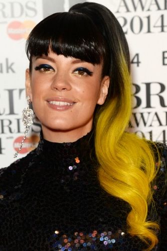 <p>Ensuring all eyes were on her, Lily showcased a beaming yellow ponytail and went for heavy black eyeliner to mirror her shiny bangs.</p>
<p><a href="http://www.cosmopolitan.co.uk/fashion/news/brits-red-carpet-2014" target="_blank">NOW SEE THE BRITS CELEBRITY DRESSES</a></p>
<p><a href="http://www.cosmopolitan.co.uk/beauty-hair/news/styles/celebrity/celebrity-hairstyles-elle-awards-2014" target="_self">OR THE INCREDIBLE ELLE AWARDS HAIRSTYLES</a></p>
<p><a href="http://www.cosmopolitan.co.uk/beauty-hair/news/trends/celebrity-frow-hair-fashion-week" target="_self">AND THE FRONT ROW HAIR WE WANT</a><br /><br /></p>