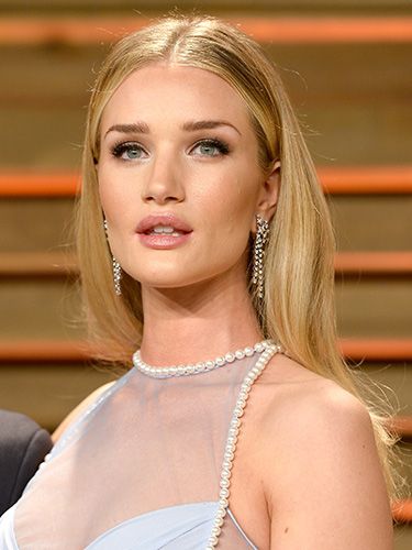 <p>Looking angelic with a simple centre-parted blow-dry, Rosie was pretty as a picture. Her subtle metallic eye makeup reflected her dazzling earrings a treat.</p>
<p><strong>MORE OSCARS BEAUTY YOU NEED IN YOUR LIFE:</strong></p>
<p><a href="http://www.cosmopolitan.co.uk/beauty-hair/news/trends/celebrity-beauty/oscars-2014-best-celebrity-beauty" target="_self">10 AMAZING OSCARS 2014 HAIRSTYLES</a></p>
<p><a href="http://www.cosmopolitan.co.uk/beauty-hair/news/beauty-news/margot-robbie-brown-brunette-hair" target="_self">MARGOT ROBBIE GOES BRUNETTE FOR THE OSCARS</a></p>
<p><a href="http://www.cosmopolitan.co.uk/beauty-hair/news/styles/celebrity/lupita-nyong-o-oscars-2014-hairstyles" target="_self">A CLOSE-UP LOOK AT LUPITA NYONG'O'S OSCARS HAIR</a></p>