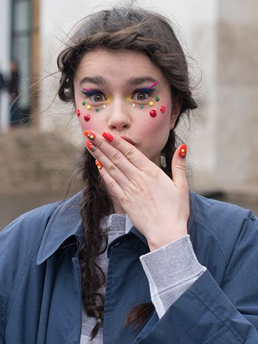 <p>Model Dasha Bilyuk was showcasing the Manish Arora catwalk style on the streets, and we liked what we see. Her multi-coloured makeup and matching nail art was young, fun and flirty. Nice to note that pigtail plaits are catching on too.</p>
<p><a href="http://www.cosmopolitan.co.uk/beauty-hair/news/trends/hair-makeup-trends-autumn-winter-2014" target="_self">BIG BEAUTY TRENDS FROM PARIS FASHION WEEK</a></p>
<p><a href="http://www.cosmopolitan.co.uk/beauty-hair/news/trends/celebrity-frow-hair-fashion-week" target="_self">FRONT ROW HAIRSTYLES - FASHION WEEK AW14</a></p>
<p><a href="http://www.cosmopolitan.co.uk/beauty-hair/news/trends/celebrity-beauty/celebrity-nail-art-manicures" target="_self">CELEBRITY NAIL ART MANICURE PICTURES</a></p>