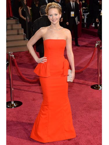 <p>Jennifer Lawrence. A Dior dress. An embarrassing fall. It's like the 2013 Oscars all over again! We weren't surprised to see her take a tumble - her Brian Atwood heels were MEGA high. Dressed in Dior, of course, the red strapless gown with peplum detail made JLaw look as statuesque as an Oscar. A Ferragamo clutch and dazzling necklace finished her look.</p>
<p><a href="http://www.cosmopolitan.co.uk/fashion/news/oscars-2014-red-carpet-dresses" target="_blank">OSCARS 2014: RED CARPET ARRIVALS<strong></strong></a></p>
<p><a href="http://www.cosmopolitan.co.uk/fashion/news/oscars-2014-best-dressed" target="_blank">THE 5 BEST DRESSES AT THE OSCARS 2014</a></p>
<p><a href="http://www.cosmopolitan.co.uk/fashion/news/every-best-actress-dress-infographic" target="_blank">EVERY BEST ACTRESS WINNER'S OSCARS DRESS SINCE 1929</a></p>
<div style="overflow: hidden; color: #000000; background-color: #ffffff; text-align: left; text-decoration: none;"> </div>