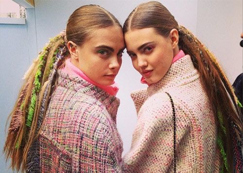 <p><strong>The look:</strong> Tweed dreads, as pictured on Cara Delevingne and Lindsey Wixson. Hairstylist supremo, Sam McKnight explained: "I exaggerated a simple pony and blew it up in proportion and detail, incorporating crimped extensions, braided hair in multicoloured Chanel tweed rags, lace and pearls." Erm, wow! Makeup featured coordinating colourful eye shadow.</p>
<p><strong>The products:</strong> Sam used Fudge Salt Spray then Oribe Texturizer to create a dry volume. He then crimped pieces randomly, woven and braided with the Chanel fabrics.</p>
<p><em>Photo credit: Sam McKnight Instagram</em></p>