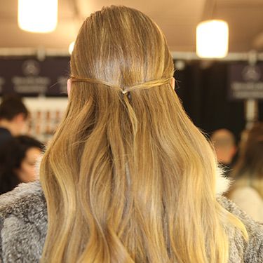 <p>This delicate 'do is all about the secret braid in the underneath of the hair. On the models at Badgley Mischka hairstylist Peter Gray took a small vertical section of hair at the back and made a small braid close to the head. He then took a thin strand of hair from just above the front of both ears, tied them together with a clear elastic at the back and U-pinned it into the braid underneath. Clever! Finish with some Moroccanoil Luminous Hairspray and Moroccanoil Glimmer Shine Spray for a luxurious look.</p>
<p><a href="http://www.cosmopolitan.co.uk/beauty-hair/news/trends/hair-makeup-trends-autumn-winter-2014" target="_self">MORE BEAUTY TRENDS FROM FASHION WEEK AW14</a></p>
<p><a href="http://www.cosmopolitan.co.uk/beauty-hair/news/styles/hair-trends-spring-summer-2014" target="_self">THE TOP 10 HAIRSTYLE TRENDS FOR 2014</a></p>
<p><a href="http://www.cosmopolitan.co.uk/beauty-hair/news/styles/spring_summer-2014-hair-colour-trends" target="_self">SPRING/SUMMER HAIR COLOUR TRENDS</a></p>