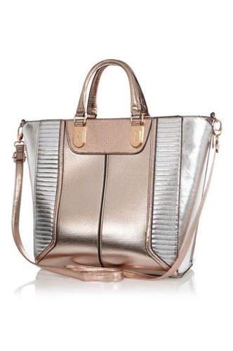 <p>Add a sheen to your look - literally - with a metallic tote bag; big enough to cart around all your stuff and totally on trend, too.</p>
<p>Metallic tote bag, £45, <a href="http://www.riverisland.com/women/bags--purses/shopper--tote-bags/Rose-gold-metallic-colour-block-tote-bag-651309" target="_blank">riverisland.com</a></p>
<p><a href="http://www.cosmopolitan.co.uk/fashion/shopping/spring-shoes-fashion-high-street" target="_blank">STEP INTO NEW SEASON: 10 PAIRS OF SPRING-LIKE SHOES</a></p>
<p><a href="http://www.cosmopolitan.co.uk/fashion/shopping/handbags-spring-fashion-high-street" target="_blank">NEW SEASON ARM CANDY: 12 HOT HANDBAGS</a></p>
<p><a href="http://www.cosmopolitan.co.uk/fashion/shopping/spring-fashion-trends-2014?page=1" target="_blank">7 BIG FASHION TRENDS FOR SPRING 2014</a></p>