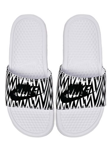 <p>We couldn't quite get our head around the pool slides trend until we saw these bad boys. Slightly more slimline than other styles we've seen and we love the graphic print, too.</p>
<p>Nike Benassi printed sliders, £16, <a href="http://www.asos.com/Nike/Nike-Benassi-White-Printed-Sliders/Prod/pgeproduct.aspx?iid=3528189&SearchQuery=nike&Rf-700=1000&sh=0&pge=0&pgesize=36&sort=-1&clr=White" target="_blank">asos.com</a></p>
<p><a href="http://www.cosmopolitan.co.uk/fashion/shopping/spring-shoes-fashion-high-street" target="_blank">STEP INTO NEW SEASON: 10 PAIRS OF SPRING-LIKE SHOES</a></p>
<p><a href="http://www.cosmopolitan.co.uk/fashion/shopping/handbags-spring-fashion-high-street" target="_blank">NEW SEASON ARM CANDY: 12 HOT HANDBAGS</a></p>
<p><a href="http://www.cosmopolitan.co.uk/fashion/shopping/spring-fashion-trends-2014?page=1" target="_blank">7 BIG FASHION TRENDS FOR SPRING 2014</a></p>