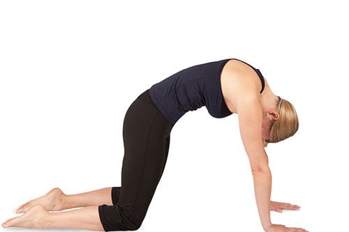 <p><strong>This move mobilises the spine and opens the lower back to increase blood flow and thereby reduce bloating.</strong></p>
<p>Kneel with your knees and hands on your mat, aligning hands under shoulders and knees under hips. Ensure the spine is in a neutral position and the abdomen is lifted.</p>
<p>Round your lower back, bringing your tailbone through your legs and nodding your chin towards your chest into a cat-like position.</p>
<p>Return to neutral position leading with the tailbone.</p>
<p>Draw your shoulder blades down, lift your head and your 'sitz' or sitting bones into a cow-like position.</p>
<p>Alternate between cat/cow 5 times, maintaining your own flow and speed.<a href="http://www.cosmopolitan.co.uk/diet-fitness/fitness/at-home-workout-that-girl-charli-cohen-christina-howells" target="_blank"><em><br /><br /></em>THE BUSY GIRL'S WORKOUT</a></p>
<p><a href="http://www.cosmopolitan.co.uk/diet-fitness/fitness/the-benefits-of-pilates" target="_blank">WHY WE LOVE PILATES</a></p>
<p><a href="http://www.cosmopolitan.co.uk/diet-fitness/fitness/the-benefits-of-spinning" target="_blank">GET YOUR SPIN ON </a></p>