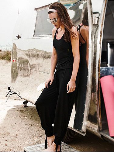 <p>Create the illusion of curves with gathered details or stitching that will add shape around your waist. Avoid shapeless jackets in favour of more fitted styles.  </p>
<p>Jumpsuit, £85, <a href="http://www.sweatybetty.com/palazzo-jumpsuit-prodsb794_black/" target="_blank">Sweaty Betty</a></p>
<p><a href="http://www.cosmopolitan.co.uk/diet-fitness/fitness/how-to-find-the-perfect-sports-bra" target="_blank">CHOOSE THE RIGHT SPORTS BRA</a></p>
<p><a href="http://www.cosmopolitan.co.uk/fashion/shopping/workout-clothes-stylish-women?click=main_sr" target="_blank">WORKOUT CLOTHES YOU'LL WANT TO WEAR</a></p>
<p><a href="http://www.cosmopolitan.co.uk/fashion/news/yoga-pants-wear-to-work?click=main_sr" target="_blank">SPORTS GEAR YOU CAN WEAR TO WORK</a></p>