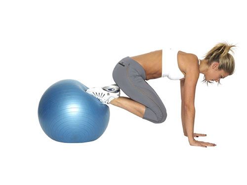 <p><strong>Great for: Strengthening your core, back, shoulders and bum, while keeping your heart rate up.</strong></p>
<p>Get into a press-up position with your hands on the floor and your ankles resting on a Swiss ball.</p>
<p>Keeping your back and bum lifted, draw your knees in under your torso, sliding the ball forwards.</p>
<p>Push your feet away again, squeezing your bum as your legs extend. Don't let your hips drop.</p>
<p>Repeat 10-20 times.</p>
<p><a href="http://www.cosmopolitan.co.uk/diet-fitness/fitness/the-fat-burning-workout" target="_blank">SUPERCHARGE YOUR WORKOUT</a></p>
<p><a href="http://www.cosmopolitan.co.uk/diet-fitness/fitness/exercise-your-whole-body-with-Pixie-Lott-workout" target="_blank">TRAIN LIKE PIXIE LOTT</a></p>
<p><a href="http://www.cosmopolitan.co.uk/diet-fitness/fitness/flatten-your-stomach-with-pilates" target="_blank">GET A FLAT TUM WITH PILATES</a></p>