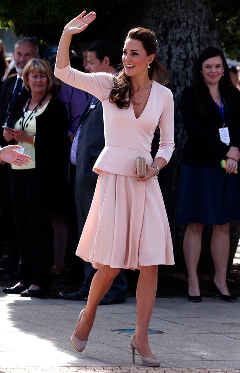 <p>Alexander McQueen was once again the Duchess' designer of choice for her Adelaide stop-off. Kate wears a soft pink, long-sleeved, V-neck top with a peplum detail, and a pleated A-line skirt.</p>
<p><strong>MORE ROYAL SHENANIGANS:</strong></p>
<p><a href="http://www.cosmopolitan.co.uk/fashion/kate-middletons-royal-style-109645?click=main_sr" target="_blank">KATE MIDDLETON'S ROYAL STYLE CV</a></p>
<p><a href="http://www.cosmopolitan.co.uk/celebs/celebrity-gossip/kate-middleton-prince-william-george-photo?click=main_sr" target="_blank">BABY GEORGE'S FIRST OFFICIAL PIC</a></p>
<p><a href="http://www.cosmopolitan.co.uk/love-sex/cosmo-centerfolds/prince-harry-william-lookalikes-naked-centrefolds?click=main_sr" target="_blank">THE PRINCES STRIP FOR COSMO</a></p>