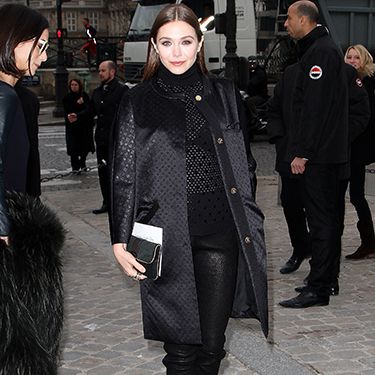 <p>This is the way to style out leather trousers at Paris Fashion Week. Black court heels, sheer mesh polo neck and a jacquard print collarless coat. Elizabeth Olsen - a style maven in our eyes - looks tres chic especially with her slicked down hair and dark nude lips. Definitely try this at home.</p>
<p><a href="http://www.cosmopolitan.co.uk/fashion/shopping/how-to-shop-for-vintage-clothes-expert-tips" target="_blank">HOW TO SHOP FOR VINTAGE CLOTHES</a></p>
<p><a href="http://www.cosmopolitan.co.uk/fashion/shopping/how-to-style-animal-print-trend" target="_blank">7 WAYS TO STYLE ANIMAL PRINT</a></p>
<p><a href="http://www.cosmopolitan.co.uk/fashion/shopping/10-wedding-guest-outfits-from-the-high-street" target="_blank">10 WEDDING GUEST OUTFITS</a></p>