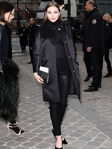 <p>This is the way to style out leather trousers at Paris Fashion Week. Black court heels, sheer mesh polo neck and a jacquard print collarless coat. Elizabeth Olsen - a style maven in our eyes - looks tres chic especially with her slicked down hair and dark nude lips. Definitely try this at home.</p>
<p><a href="http://www.cosmopolitan.co.uk/fashion/shopping/how-to-shop-for-vintage-clothes-expert-tips" target="_blank">HOW TO SHOP FOR VINTAGE CLOTHES</a></p>
<p><a href="http://www.cosmopolitan.co.uk/fashion/shopping/how-to-style-animal-print-trend" target="_blank">7 WAYS TO STYLE ANIMAL PRINT</a></p>
<p><a href="http://www.cosmopolitan.co.uk/fashion/shopping/10-wedding-guest-outfits-from-the-high-street" target="_blank">10 WEDDING GUEST OUTFITS</a></p>