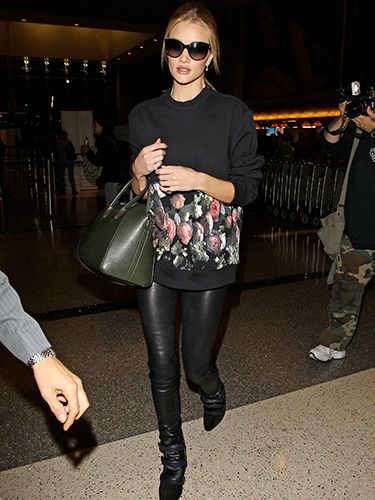 <p>A fantastic way of dressing down leathers without going to casual - heeled boots, a floral printed black sweatshirt, 'It' bag and oversized glasses. RHW, you babe.</p>
<p><a href="http://www.cosmopolitan.co.uk/fashion/shopping/how-to-shop-for-vintage-clothes-expert-tips" target="_blank">HOW TO SHOP FOR VINTAGE CLOTHES</a></p>
<p><a href="http://www.cosmopolitan.co.uk/fashion/shopping/how-to-style-animal-print-trend" target="_blank">7 WAYS TO STYLE ANIMAL PRINT</a></p>
<p><a href="http://www.cosmopolitan.co.uk/fashion/shopping/10-wedding-guest-outfits-from-the-high-street" target="_blank">10 WEDDING GUEST OUTFITS</a></p>