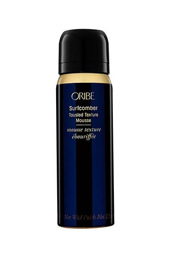 <p>When you want to seal in those surfer waves, this mousse is an utter must; it's the celeb way of working beachy vibes without a salty grit. Plus, the teeny tiny tin can be chucked in your beach bag, so you can whip it out when you leave the ocean to enhance your tousled look.</p>
<p><a href="http://uk.spacenk.com/travel-size-surfcomber-mousse/MUK200012667.html" target="_blank">Oribe Surfcomber Mousse, £18</a></p>
<p><a href="http://www.cosmopolitan.co.uk/beauty-hair/beauty-tips/holiday-beauty-packing-list?click=main_sr" target="_blank">YOUR HOLIDAY BEAUTY PACKING LIST</a></p>
<p><a href="http://www.cosmopolitan.co.uk/beauty-hair/news/trends/celebrity-beauty/abbey-clancy-beauty-interview?click=main_sr" target="_blank">ABBEY CLANCY'S EVERYTHING GUIDE TO SUMMER BEAUTY PRODUCTS</a></p>
<p><a href="http://www.cosmopolitan.co.uk/blogs/the-best-beauty-tips-from-around-the-world?click=main_sr" target="_blank">THE BEST BEAUTY TIPS FROM AROUND THE WORLD</a></p>