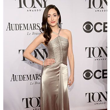 <p>Actress Emmy Rossum looked gorgeous in a floor-length champagne silk dress to present an award at the Tony's ceremony. We think the knotted bodice of her gown along with the halterneck looks every bit <em>glorious</em> on her.</p>
<p><a href="http://www.cosmopolitan.co.uk/fashion/guys-awards-red-carpet-looks" target="_blank">THE BEST LOOKS FROM THE GUYS' CHOICE AWARDS</a></p>
<p><a href="http://www.cosmopolitan.co.uk/fashion/news/best-of-the-cfda-red-carpet?page=1" target="_blank">HOTTEST RED CARPET LOOKS AT THE CFDAS</a></p>
<p><a href="http://www.cosmopolitan.co.uk/fashion/shopping/ten-of-the-best-summer-shoes" target="_blank">10 OF THE BEST SUMMER SHOES</a></p>