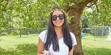 <p>Hello sunshine! We LOVE Cara Bramwell, 25, from New Zealand's summery yellow shorts from Zara. Cute! Paired with Hunters and a floral headband. (Extra points for matching shorts with drink, well-played.)</p>
<p><a href="http://www.cosmopolitan.co.uk/fashion/shopping/festival-season-essentials?click=main_sr" target="_blank">ALL THE FESTIVAL ESSENTIAL'S YOU'LL EVER NEED</a></p>
<p><a href="http://www.cosmopolitan.co.uk/campus/summer-full-festivals-cheap-volunteering?click=main_sr" target="_blank">HOW TO HAVE A FESTIVAL FULL OF SUMMERS ON THE CHEAP</a></p>
<p><a href="http://www.cosmopolitan.co.uk/celebs/entertainment/coachella-festival-2014-celebrity-instagrams?click=main_sr" target="_blank">THE BEST CELEB INSTAGRAMS FROM COACHELLA 2014</a></p>