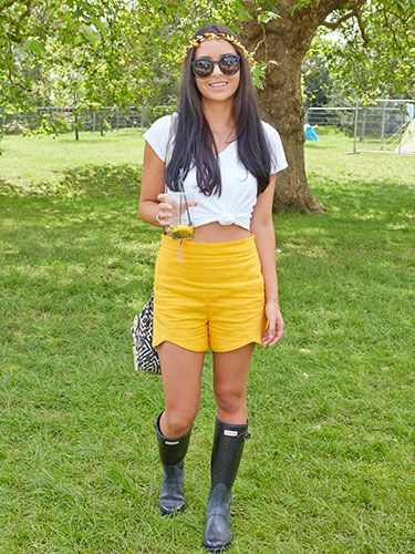 <p>Hello sunshine! We LOVE Cara Bramwell, 25, from New Zealand's summery yellow shorts from Zara. Cute! Paired with Hunters and a floral headband. (Extra points for matching shorts with drink, well-played.)</p>
<p><a href="http://www.cosmopolitan.co.uk/fashion/shopping/festival-season-essentials?click=main_sr" target="_blank">ALL THE FESTIVAL ESSENTIAL'S YOU'LL EVER NEED</a></p>
<p><a href="http://www.cosmopolitan.co.uk/campus/summer-full-festivals-cheap-volunteering?click=main_sr" target="_blank">HOW TO HAVE A FESTIVAL FULL OF SUMMERS ON THE CHEAP</a></p>
<p><a href="http://www.cosmopolitan.co.uk/celebs/entertainment/coachella-festival-2014-celebrity-instagrams?click=main_sr" target="_blank">THE BEST CELEB INSTAGRAMS FROM COACHELLA 2014</a></p>