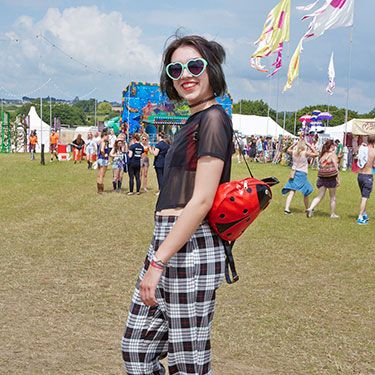 <p>We clocked Cat O'Brien, 18, from Farnham's cute ladybird bag from afar – the ultimate charity shop bargain (jealous!). Her Gwen Stefani-esque trousers are another charity shop find too.</p>
<p><a href="http://www.cosmopolitan.co.uk/fashion/shopping/festival-season-essentials?click=main_sr" target="_blank">ALL THE FESTIVAL ESSENTIAL'S YOU'LL EVER NEED</a></p>
<p><a href="http://www.cosmopolitan.co.uk/campus/summer-full-festivals-cheap-volunteering?click=main_sr" target="_blank">HOW TO HAVE A FESTIVAL FULL OF SUMMERS ON THE CHEAP</a></p>
<p><a href="http://www.cosmopolitan.co.uk/celebs/entertainment/coachella-festival-2014-celebrity-instagrams?click=main_sr" target="_blank">THE BEST CELEB INSTAGRAMS FROM COACHELLA 2014</a></p>