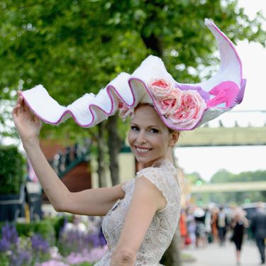 <p>We bet she's been waiting for just the right occasion to wear her favourite two metre wide hat. What could be a better place than at the Royal Ascot?</p>
<p><a href="http://www.cosmopolitan.co.uk/fashion/news/floppy-hat-trend?click=main_sr" target="_blank">THE RETURN OF THE HAT - THE MOST ON TREND STYLES</a></p>
<p><a href="http://www.cosmopolitan.co.uk/fashion/news/milliner-stephen-jones-on-new-debenhams-collection-and-hat-wearing-etiquette?click=main_sr" target="_blank">MILLINER STEPHEN JONES ON HAT-WEARING ETIQUETTE</a></p>
<p><a href="http://www.cosmopolitan.co.uk/fashion/shopping/isle-of-wight-festival-what%27s-in-your-bag" target="_blank">WHAT'S IN YOUR FESTIVAL BAG?</a></p>