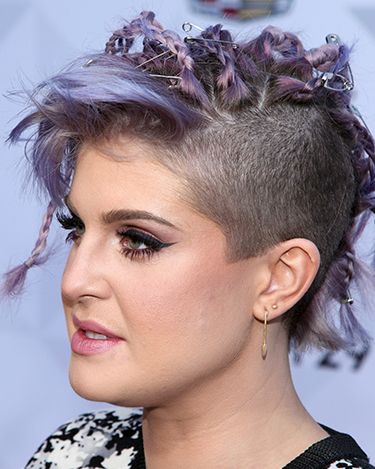 <p>What's a brave beauty story without a Kelly Osbourne? The lilac shade, punky plaits, randomly placed safety pins and shaved side section all sum up her wacky style perfectly. </p>
<p><a href="http://www.cosmopolitan.co.uk/beauty-hair/news/trends/celebrity-beauty/celebrities-with-bleached-eye-brows">CELEBS WITH BLEACHED BROWS</a></p>
<p><a href="http://www.cosmopolitan.co.uk/beauty-hair/news/styles/celebrity/face-framing-fringes-hair-trend?click=main_sr">COOL CELEB FRINGES</a></p>
<p><a href="http://www.cosmopolitan.co.uk/beauty-hair/news/trends/beauty-products/august-beauty-lab-buys">TODAY'S BEST BEAUTY BUY</a></p>