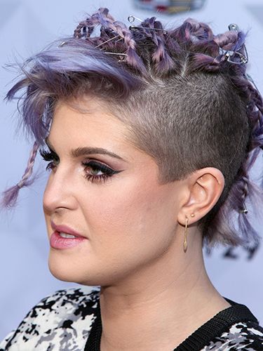 <p>What's a brave beauty story without a Kelly Osbourne? The lilac shade, punky plaits, randomly placed safety pins and shaved side section all sum up her wacky style perfectly. </p>
<p><a href="http://www.cosmopolitan.co.uk/beauty-hair/news/trends/celebrity-beauty/celebrities-with-bleached-eye-brows">CELEBS WITH BLEACHED BROWS</a></p>
<p><a href="http://www.cosmopolitan.co.uk/beauty-hair/news/styles/celebrity/face-framing-fringes-hair-trend?click=main_sr">COOL CELEB FRINGES</a></p>
<p><a href="http://www.cosmopolitan.co.uk/beauty-hair/news/trends/beauty-products/august-beauty-lab-buys">TODAY'S BEST BEAUTY BUY</a></p>