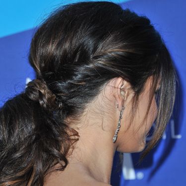<p>Is there anything more romantic than this weaved and twisted style? Selena Gomez gave a great lesson in intricate bridal hair. With a centre part and loose tendrils that lightly frame her face, she's folded rope twists on either side of her head into a glossy pony tail. The finishing touch? Her lengths are loose with a pretty plait that conceals the band, making this the perfect ponytail for those with longer locks.</p>
<p><a href="http://www.cosmopolitan.co.uk/beauty-hair/news/styles/celebrity/celebrity-plaits-and-braids" target="_blank">PRETTY PLAITS AND BEAUTIFUL BRAIDS</a></p>
<p><a href="http://www.cosmopolitan.co.uk/beauty-hair/news/trends/celebrity-beauty/female-celebrities-with-hot-undercuts" target="_blank">CELEBRITIES WITH HOT UNDERCUTS</a></p>
<p><a href="http://www.cosmopolitan.co.uk/beauty-hair/news/styles/hair-trends-spring-summer-2014" target="_blank">HUGE HAIR TRENDS FOR 2014</a></p>