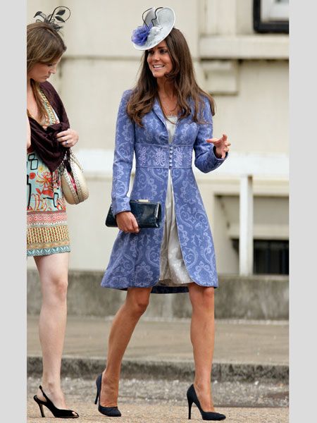 By August 2009 Kate had her royal style set and worked this sophisticated lilac jacket over a shimmering silver dress. Attending another society wedding at Wellington Barracks Kate chose navy accessories and a lilac and silver fascinator. Simply stunning!<br />