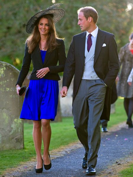 <p>Showing off her althetic figure in a midnight blue dress Kate attended a wedding with Prince William by her side earlier this year. What a lovely couple they make. All together now... ahhhhhhh  <br /><br /><a href="http://www.cosmopolitan.co.uk/your-life/the-cost-of-the-royal-wedding/v1">Now have your say on today's big issue: should the public foot the security bill for the royal wedding?</a></p><p><a href="http://www.cosmopolitan.co.uk/fashion-&-style/kate-middleton-possible-dresses/gallery">CHECK OUT KATE'S WEDDING DRESS POSSIBILITIES</a> <br /></p>