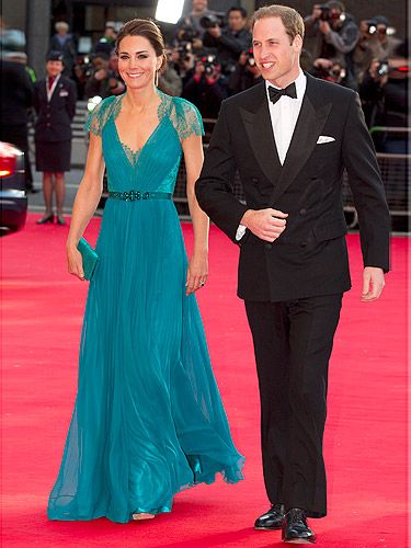 We're (jade) green with envy at Kate Middleton's latest red carpet look! The Duchess dazzled as she arrived at the Olympics concert in London. Not only do we love the beautiful chiffon pleated gown with lace cap sleeves embellished with Swarovski crystals and a bejewelled waistband, but we also heart Kate's new hairstyle: a braided bun! Gorge.