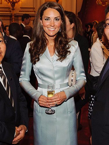 <p>For the 2012 Olympics opening ceremony reception at Buckingham Palace, Kate Middleton opted for a Christopher Kane outfit - and what a remarkable decision! The Duchess of Cambridge teamed her designer ensemble with bronzed skin, a KMiddy blow-dry and a celebratory glass of champers - LOVE.</p>
<p>.</p>