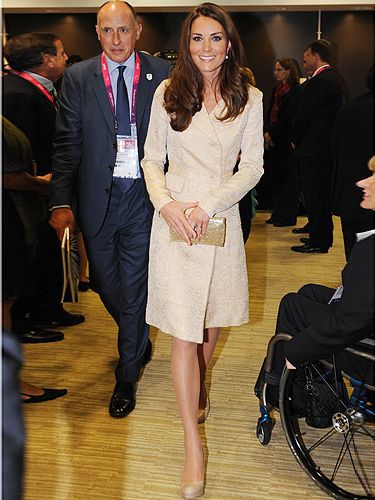 <p>Kate Middleton goes for gold at the Paralympics opening ceremony - maybe she's predicting a hefty gold medal haul for Team GB?</p>
<p>She's certainly winning in the style stakes - the thrifty Duchess recycled the DAY Birger et Mikkelsen dress coat she wore to Zara Phillips' wedding last year - teamed with her face Kurt Geiger heels, natch.</p>