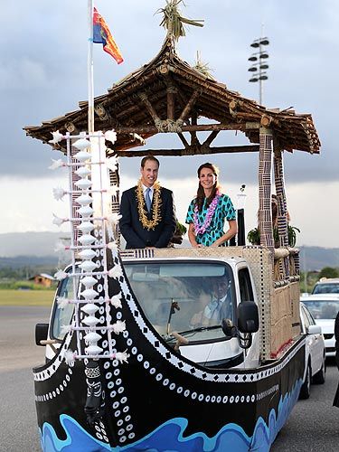 <p>Kate Middleton and her hubby Prince William, know how to travel in style. The pair boarded a special boat vehicle as they arrived at Honiara International Airport during their Diamond Jubilee tour of the Far East. And just look at her, in her gorgeous Jonathan Saunders Evelyn cotton dress and those LK Bennett heels she adores. Oh and P.S, this might be our fave pic of the loved-up couple EVER! </p>