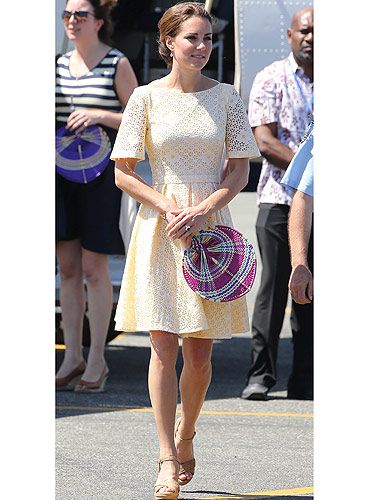 <p>Kate Middleton seems to have taken a shine to yellow frocks on her Diamond Jubilee Tour as she wore this cute eyelet dress by an independent dress maker. The Broderie Anglaise fabric and sweet pastel shade makes it perfect for the heat in Honiara as Kate embarks on the final leg of her and Prince William's Asia tour. She teamed her dress with a pair of Stuart Weitzman Minx wedges and a set of very elegant Kiki McDonough drop earrings. Kate also opted to tie her hair in a bun instead of her usual flowing waves - we're guessing the humidity was finally getting to her…</p>