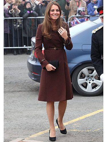 <p>The Duchess of Cambridge looks anything but grim in Grimsby. Baby mama-to-be Kate Middleton visited the National Fishing Heritage Centre looking lovely in a burgundy coat from Hobbs layered over a Great Plains dress. Apparently, the crowds were chanting, 'we want Kate!' as she arrived – well, we want Kate's wardrobe!</p>