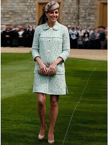 <p>There it is! Kate Middleton's growing baby bump is clearly visible under her gorge Mulberry mint coat as she attends the National Review of the Queen's Scouts at Windsor Castle. Despite being nearly 7 months pregnant, the Duchess of Cambridge still wore her trademark nude LK Bennett heels teamed with a taupe pillbox hat. We think she looks just swell, do you?</p>