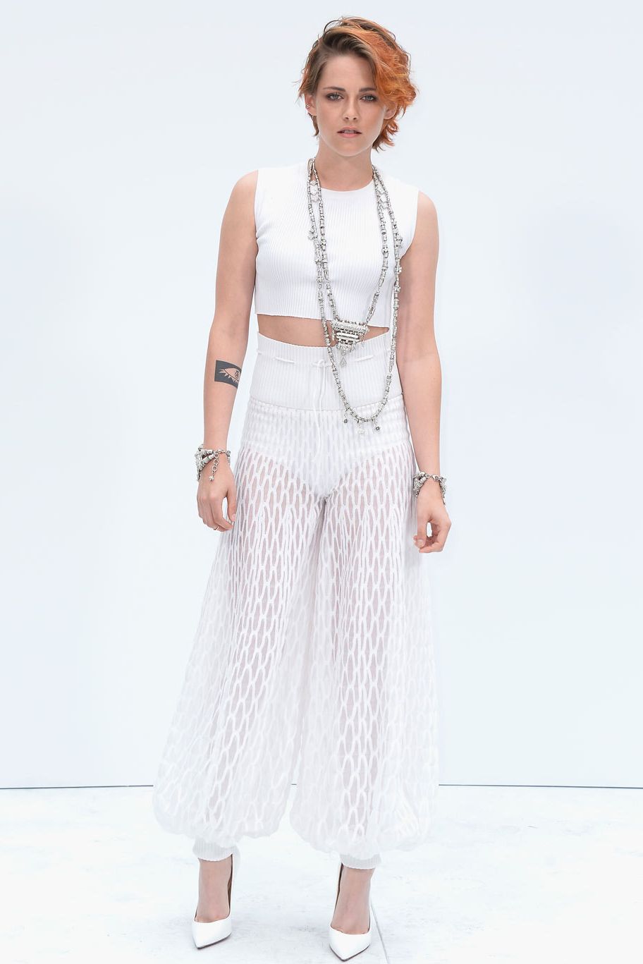 <p>Has Kristen ever looked this cool before? No. Never. Ever.</p>
<p>The Twilight actress not only debuted a brand new crop, but also showed off her fashion prowess in an all-white Chanel ensemble.</p>
<p>K-Stew's ribbed white crop top and sheer trousers made her look every inch a star, with her quirky crop and Chanel jewellery completing the look.</p>
<p><a href="http://www.cosmopolitan.co.uk/fashion/celebrity/celebrity-style-gallery">THIS WEEK'S BEST CELEBRITY STYLE</a></p>
<p><a href="http://www.cosmopolitan.co.uk/fashion/news/paris-fashion-week-versace" target="_blank">J.LO STUNS IN SILVER AT VERSACE</a></p>
<p><a href="http://www.cosmopolitan.co.uk/fashion/shopping/celebrity-weddings-1" target="_blank">AMAZING ALTERNATIVE CELEBRITY BRIDAL LOOKS</a></p>