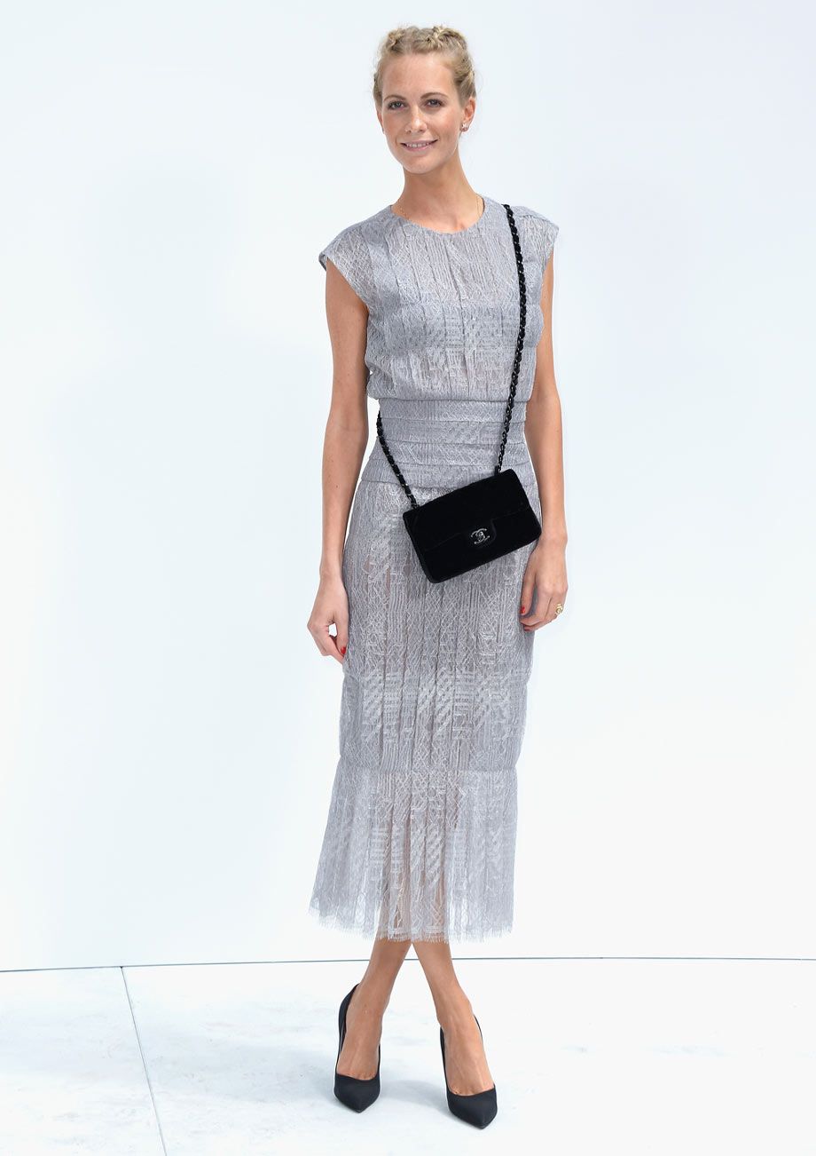 <p>Poppy Delevingne put on a lady-like show at Chanel in a simple, grey dress with black accessories. Don't you just love her plaited 'do?</p>
<p><a href="http://www.cosmopolitan.co.uk/fashion/news/paris-fashion-week-celebrities" target="_blank">ALL THE FRONT ROW FASHION FROM PARIS</a></p>
<p><a href="http://www.cosmopolitan.co.uk/fashion/news/paris-fashion-week-versace" target="_blank">J.LO WOWS IN WHITE AT VERSACE</a></p>
