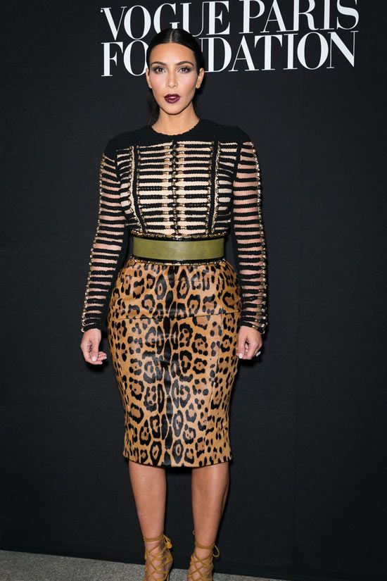<p>Kim has long been a fan of Balmain and even wore a custom dress by the label on her wedding day after changing out of her Valentino gown.</p>
<p>We love this look on Kim: the slicked back hair, the dark lippy, the leather, the leopard print... so fierce and SO good.</p>
<p><a href="http://www.cosmopolitan.co.uk/fashion/news/paris-fashion-week-celebrities" target="_blank">FABULOUS FRONT ROW CELEBRITY FASHION </a></p>
<p><a href="http://www.cosmopolitan.co.uk/fashion/news/paris-fashion-week-street-style-2014" target="_blank">STYLE SNAPPED ON THE STREES OF PARIS</a></p>