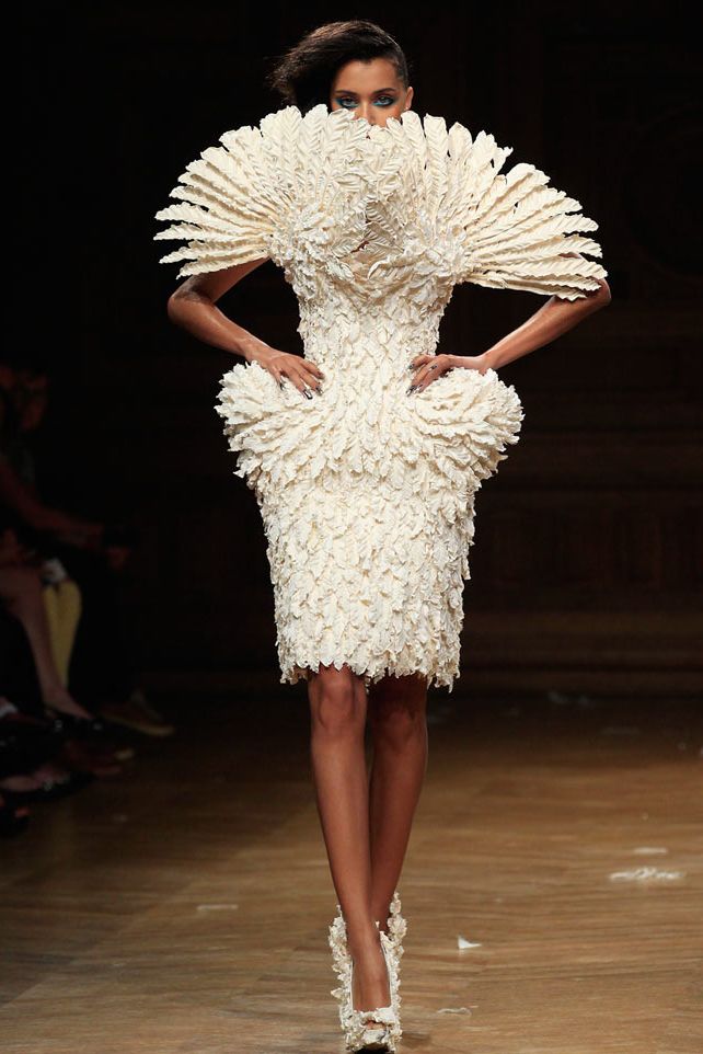 <p>What does every dress need? A face guard made of feathers, for those blustery days. Come on! You know the ones we're talking about...</p>
<p><a href="http://www.cosmopolitan.co.uk/fashion/news/vogue-gala-paris-fashion-week" target="_blank">KIM AND KENDALL'S BALMAIN ARMY</a></p>
<p><a href="http://www.cosmopolitan.co.uk/fashion/news/paris-fashion-week-celebrities" target="_blank">WHAT THE STARS ARE WEARING ON THE FRONT ROW</a></p>
<p><a href="http://www.cosmopolitan.co.uk/fashion/news/paris-fashion-week-street-style-2014" target="_blank">AMAZING STYLE FROM THE STREETS OF PARIS </a></p>